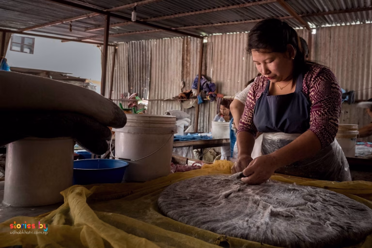 Photo from the making of a handmade felt cat cave documented in a Nepal photo story