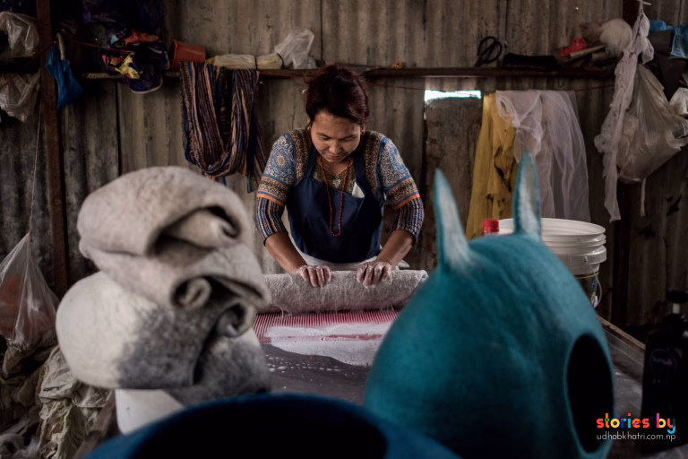 Photo from the making of a handmade felt cat cave documented in a Nepal photo story