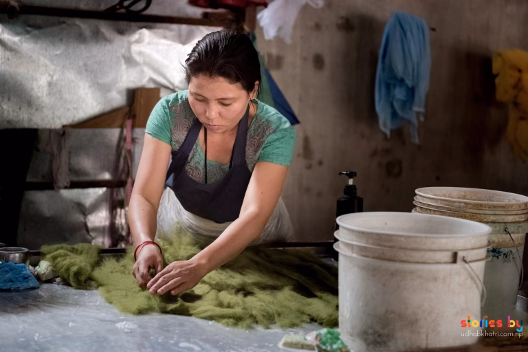 Photo from the making of a handmade felt cat cave documented in a Nepal photo story